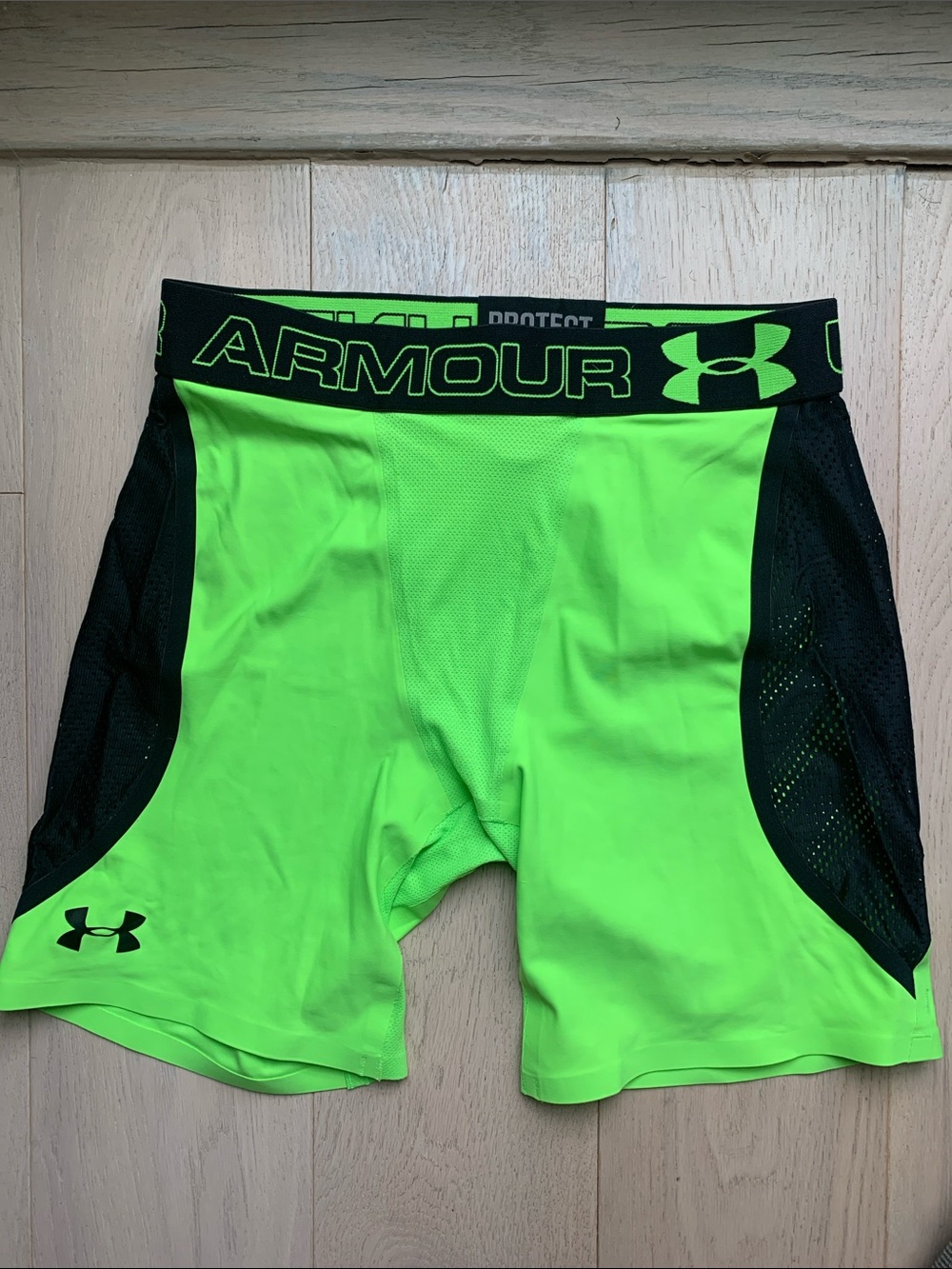 Under Armour Men’s Neon Green Compression Shorts with Black Panels